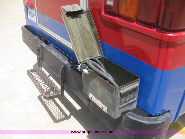 image for item D8365 1994 Ford E350 Collins transit bus