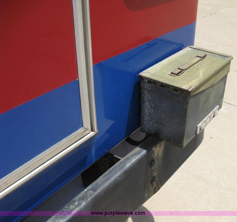 image for item D8365 1994 Ford E350 Collins transit bus