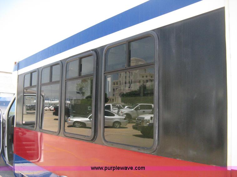 image for item D8365 1994 Ford E350 Collins transit bus