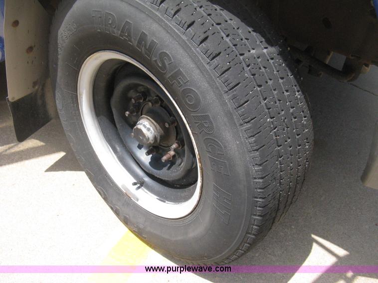 image for item D8365 1994 Ford E350 Collins transit bus