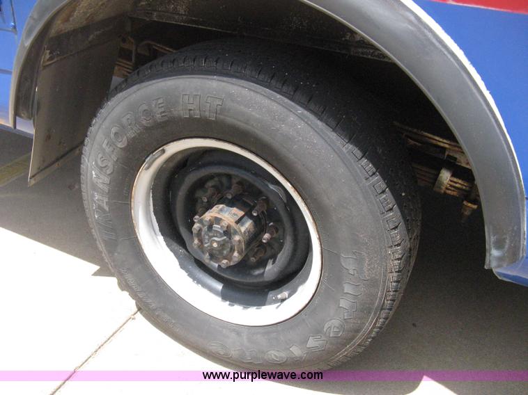 image for item D8365 1994 Ford E350 Collins transit bus