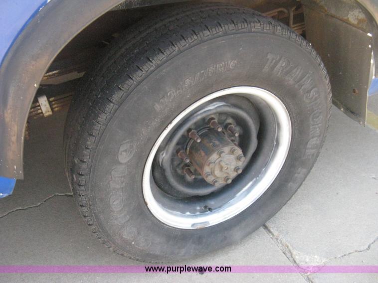 image for item D8365 1994 Ford E350 Collins transit bus