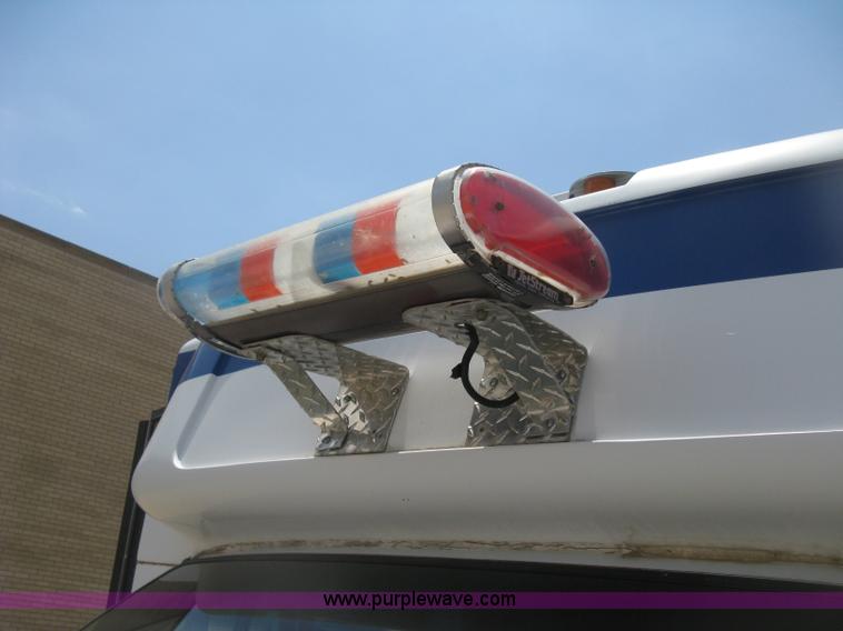 image for item D8365 1994 Ford E350 Collins transit bus