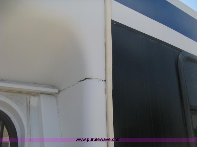 image for item D8365 1994 Ford E350 Collins transit bus