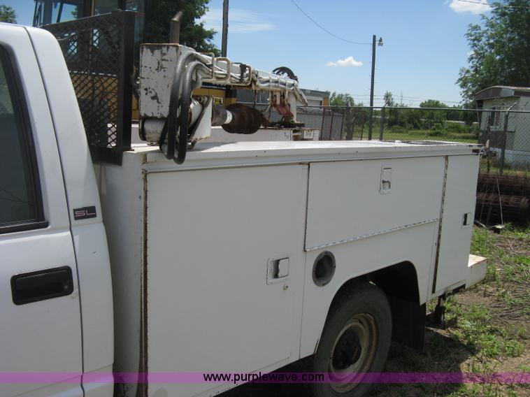 image for item D8396 1996 GMC Sierra 3500 SL digger derrick truck