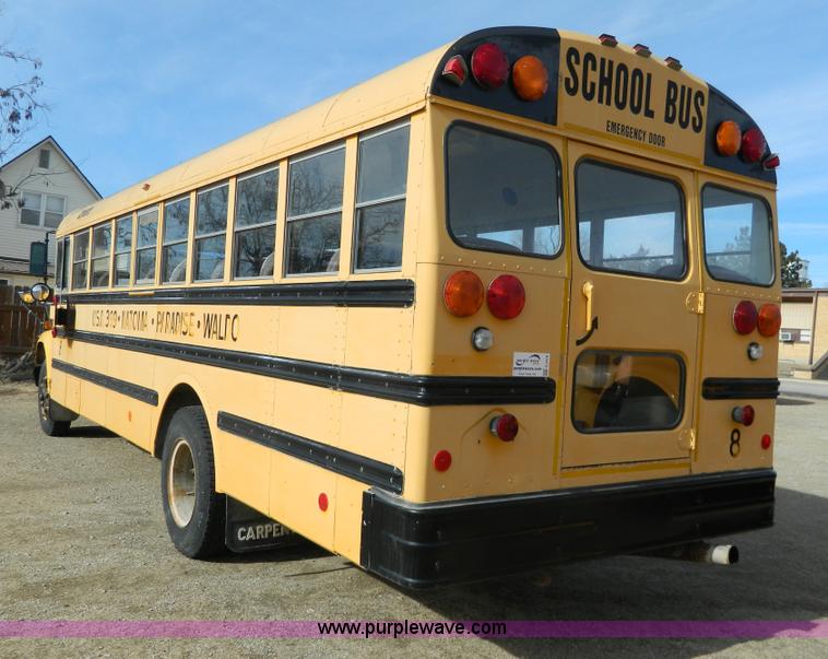 image for item G7679 1996 Ford carpenter bus