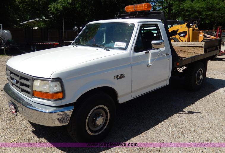 image for item H3049 1994 Ford F250 XL flatbed pickup truck