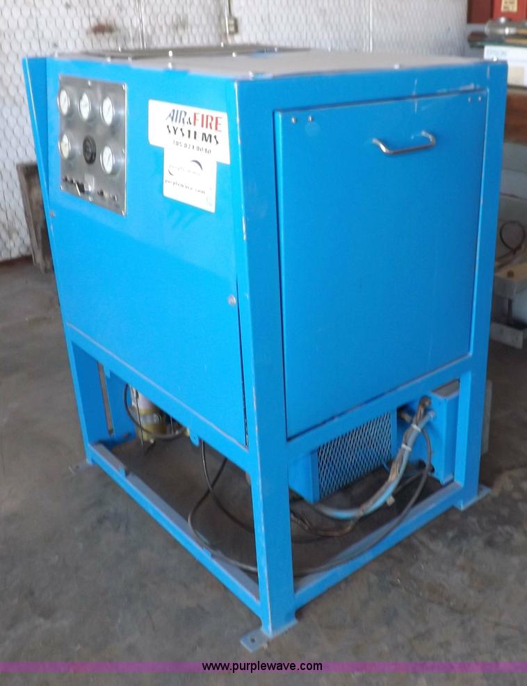 image for item H7036 Bauer 5000 CFM breathing four stage air compressor