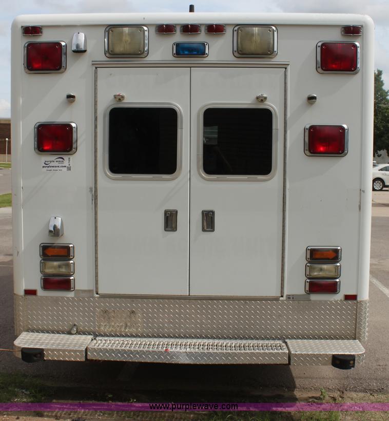 image for item H7456 1996 Freightliner FL60 emergency vehicle