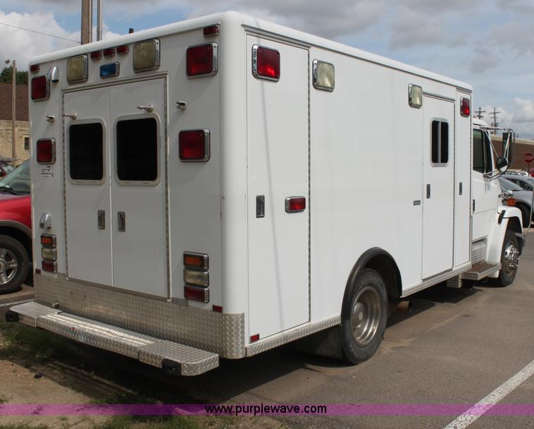 image for item H7456 1996 Freightliner FL60 emergency vehicle