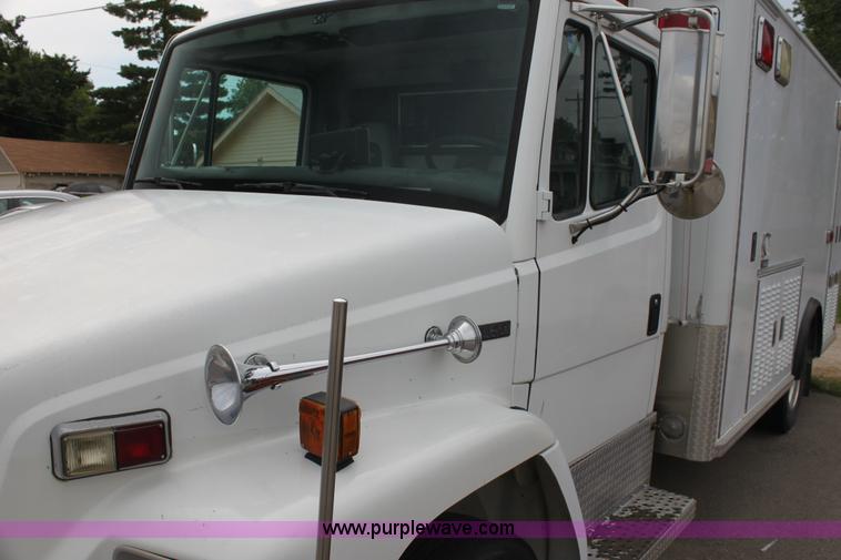 image for item H7456 1996 Freightliner FL60 emergency vehicle