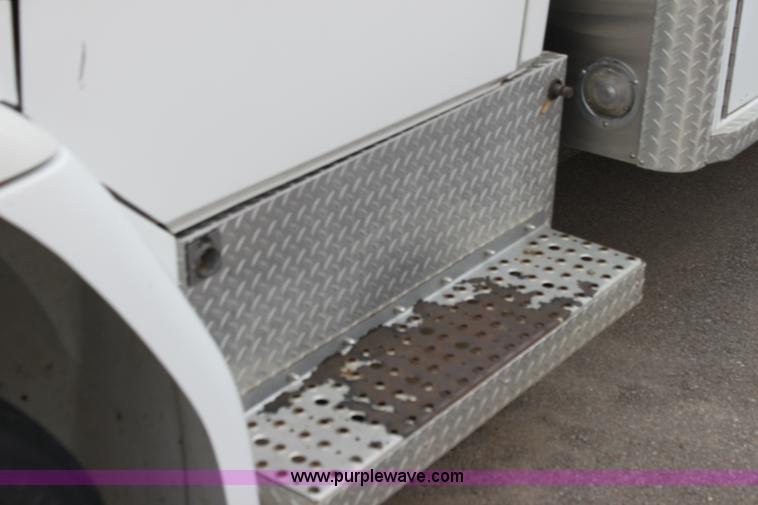 image for item H7456 1996 Freightliner FL60 emergency vehicle