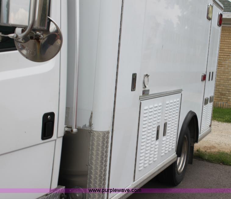 image for item H7456 1996 Freightliner FL60 emergency vehicle