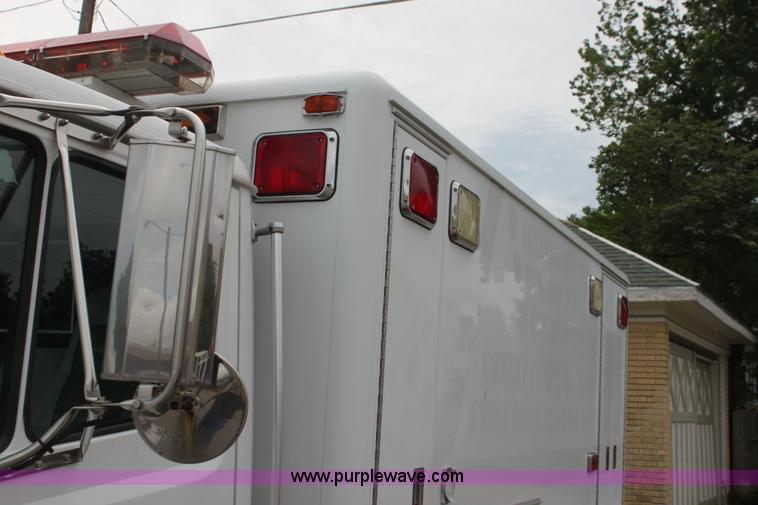 image for item H7456 1996 Freightliner FL60 emergency vehicle