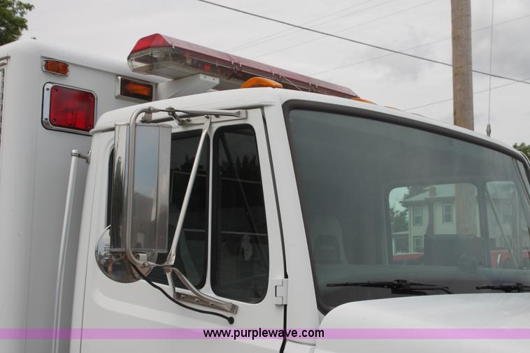image for item H7456 1996 Freightliner FL60 emergency vehicle