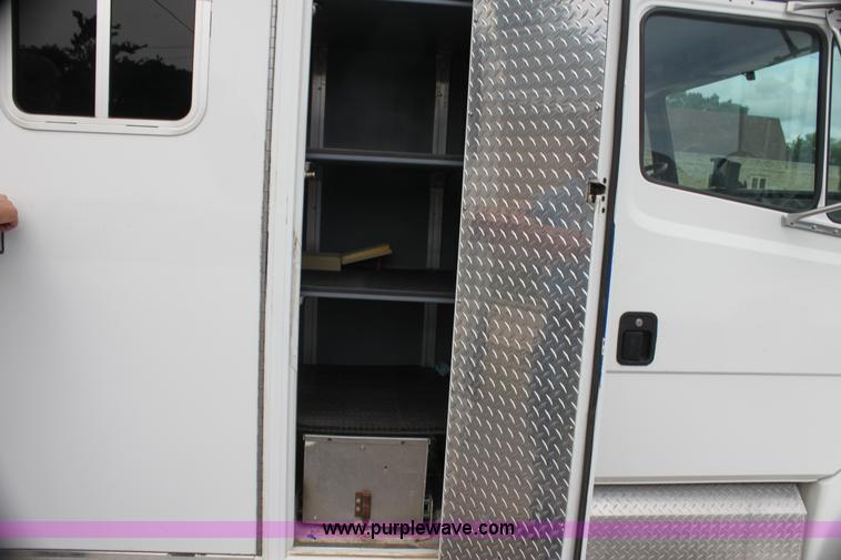 image for item H7456 1996 Freightliner FL60 emergency vehicle
