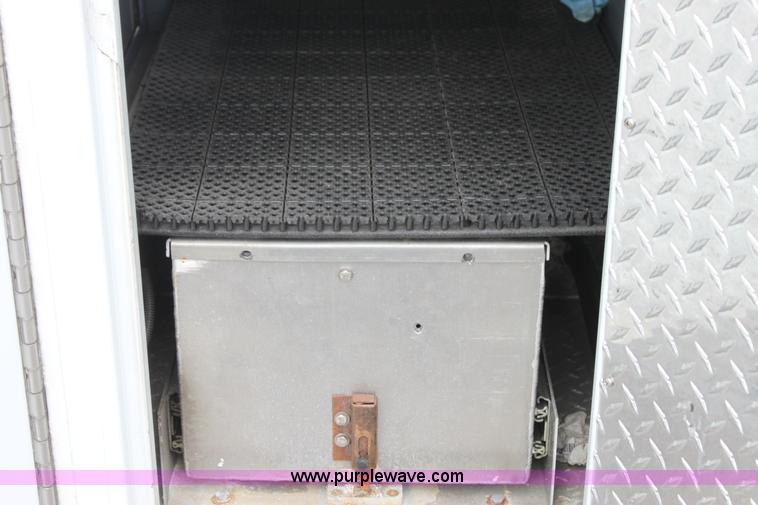 image for item H7456 1996 Freightliner FL60 emergency vehicle