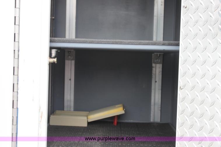 image for item H7456 1996 Freightliner FL60 emergency vehicle