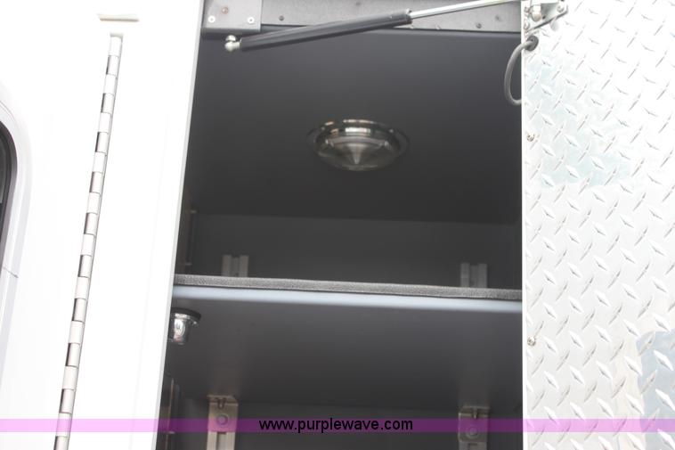 image for item H7456 1996 Freightliner FL60 emergency vehicle