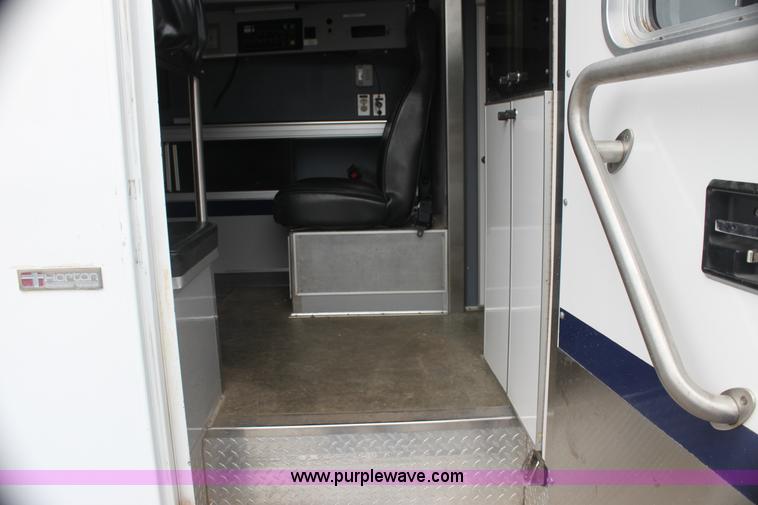 image for item H7456 1996 Freightliner FL60 emergency vehicle