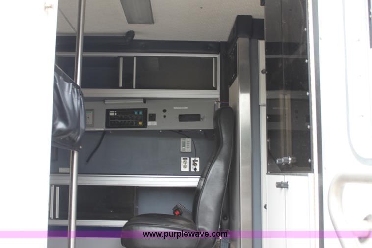 image for item H7456 1996 Freightliner FL60 emergency vehicle