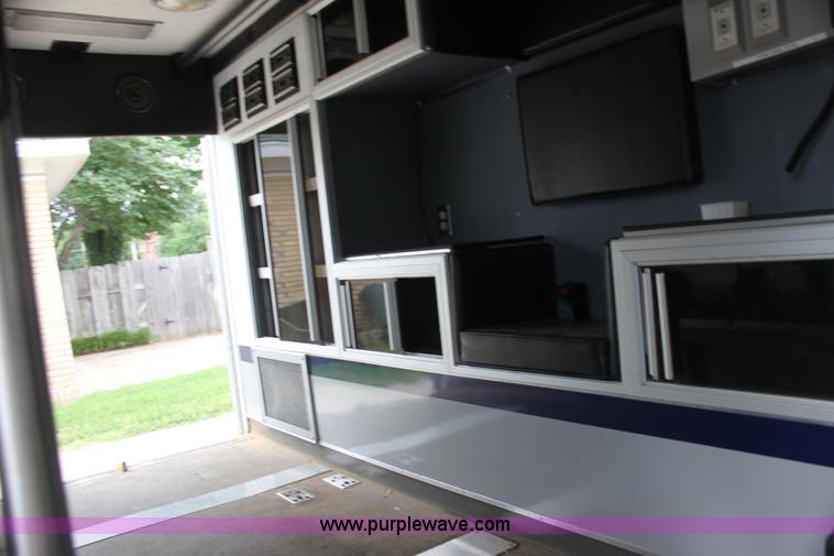 image for item H7456 1996 Freightliner FL60 emergency vehicle