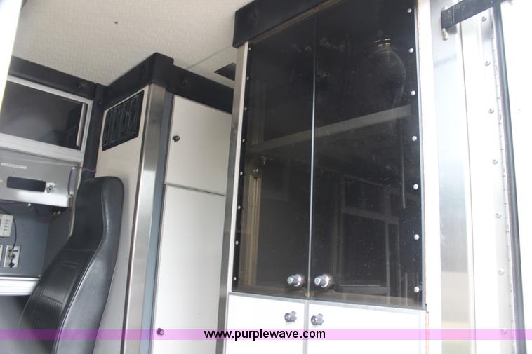 image for item H7456 1996 Freightliner FL60 emergency vehicle