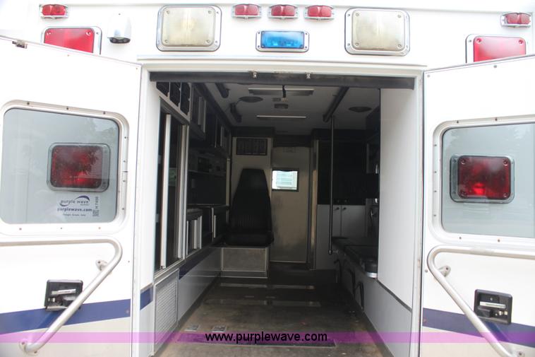 image for item H7456 1996 Freightliner FL60 emergency vehicle