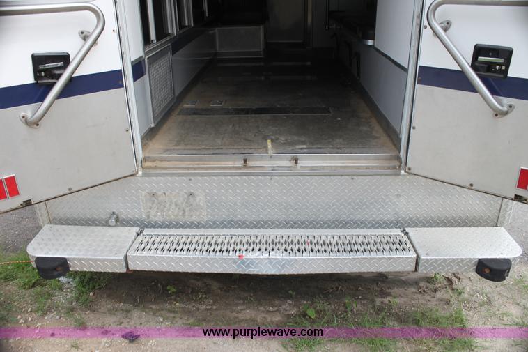 image for item H7456 1996 Freightliner FL60 emergency vehicle