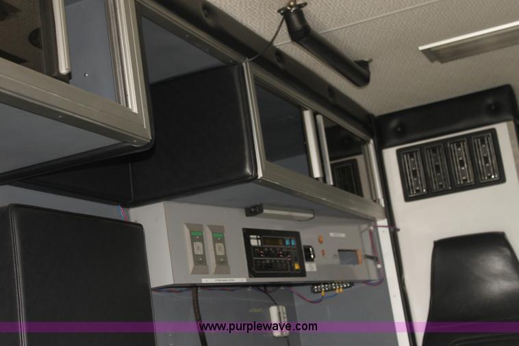 image for item H7456 1996 Freightliner FL60 emergency vehicle