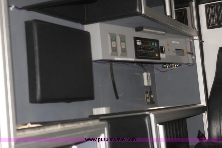 image for item H7456 1996 Freightliner FL60 emergency vehicle