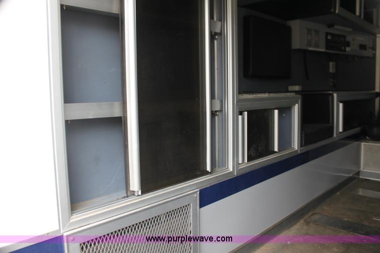 image for item H7456 1996 Freightliner FL60 emergency vehicle