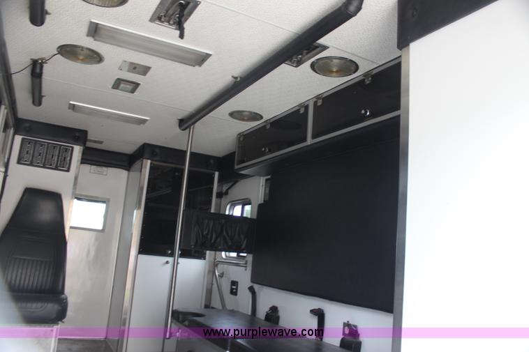 image for item H7456 1996 Freightliner FL60 emergency vehicle