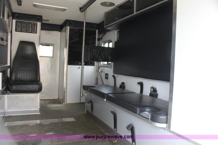 image for item H7456 1996 Freightliner FL60 emergency vehicle