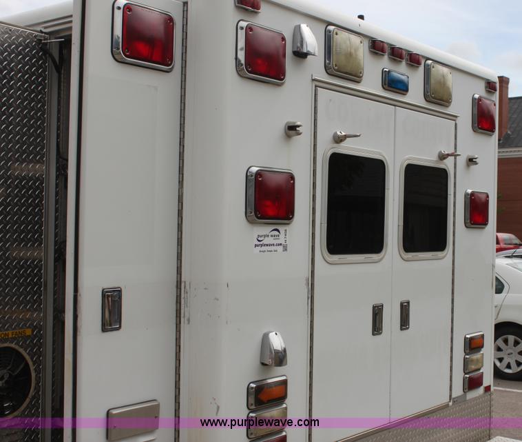 image for item H7456 1996 Freightliner FL60 emergency vehicle