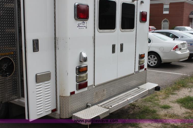 image for item H7456 1996 Freightliner FL60 emergency vehicle