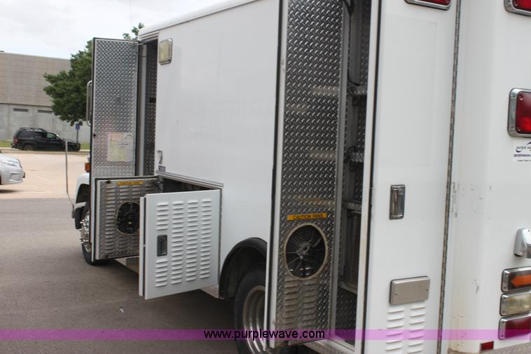 image for item H7456 1996 Freightliner FL60 emergency vehicle