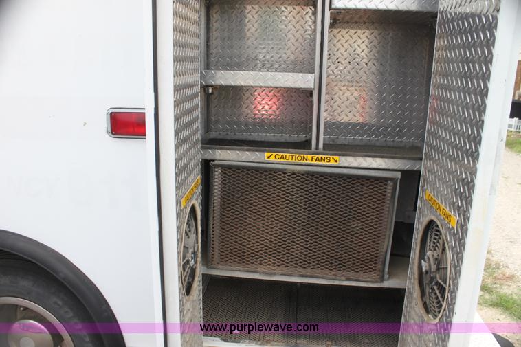 image for item H7456 1996 Freightliner FL60 emergency vehicle