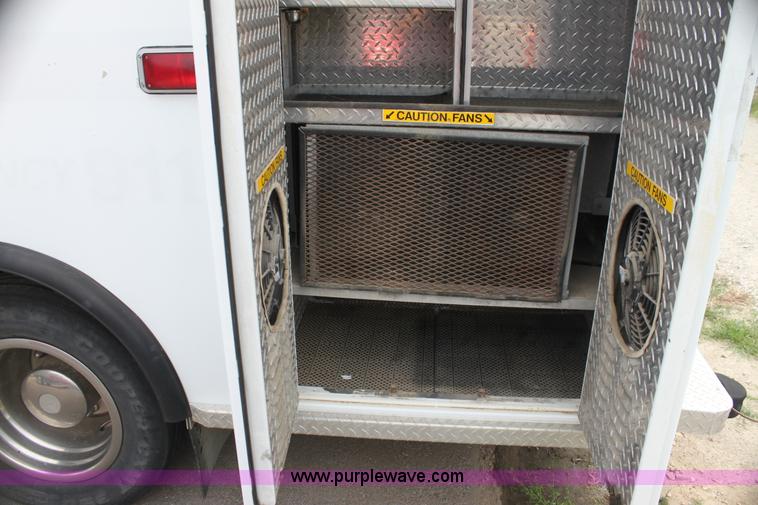 image for item H7456 1996 Freightliner FL60 emergency vehicle