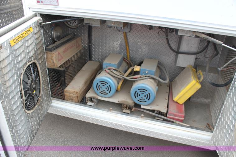 image for item H7456 1996 Freightliner FL60 emergency vehicle