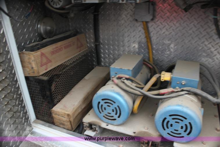 image for item H7456 1996 Freightliner FL60 emergency vehicle