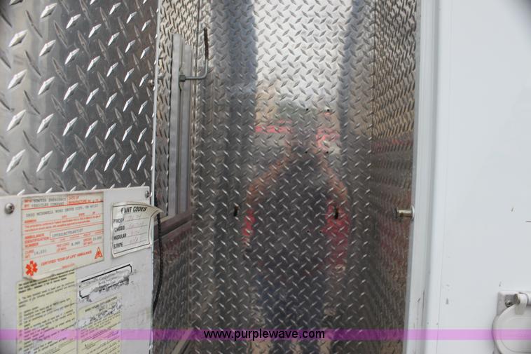 image for item H7456 1996 Freightliner FL60 emergency vehicle