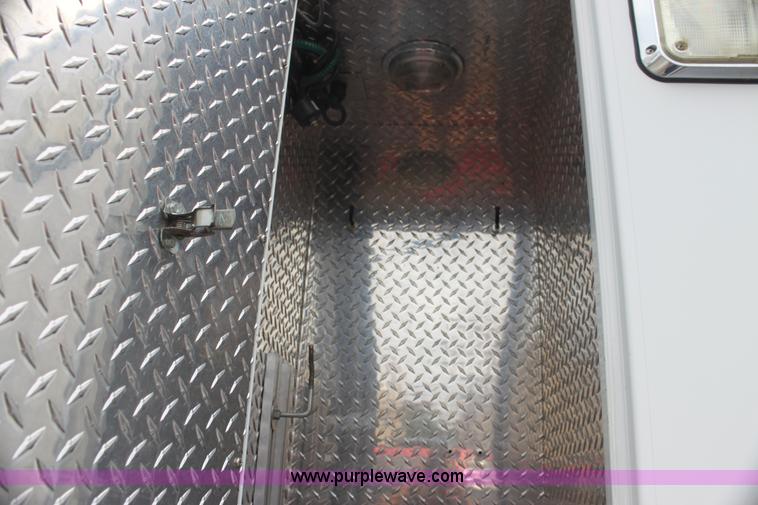 image for item H7456 1996 Freightliner FL60 emergency vehicle