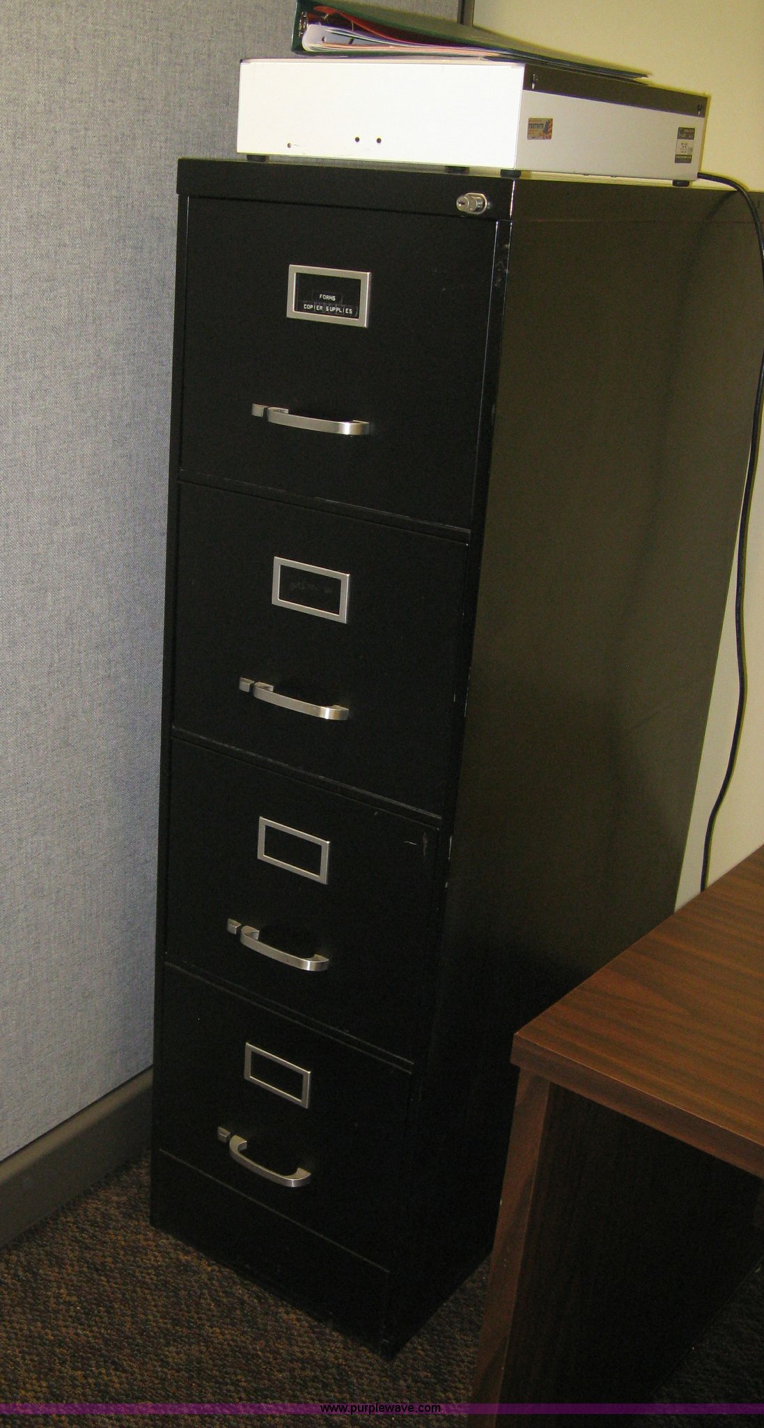 Assorted office furniture in Wichita, KS Item AH9002 sold Purple Wave