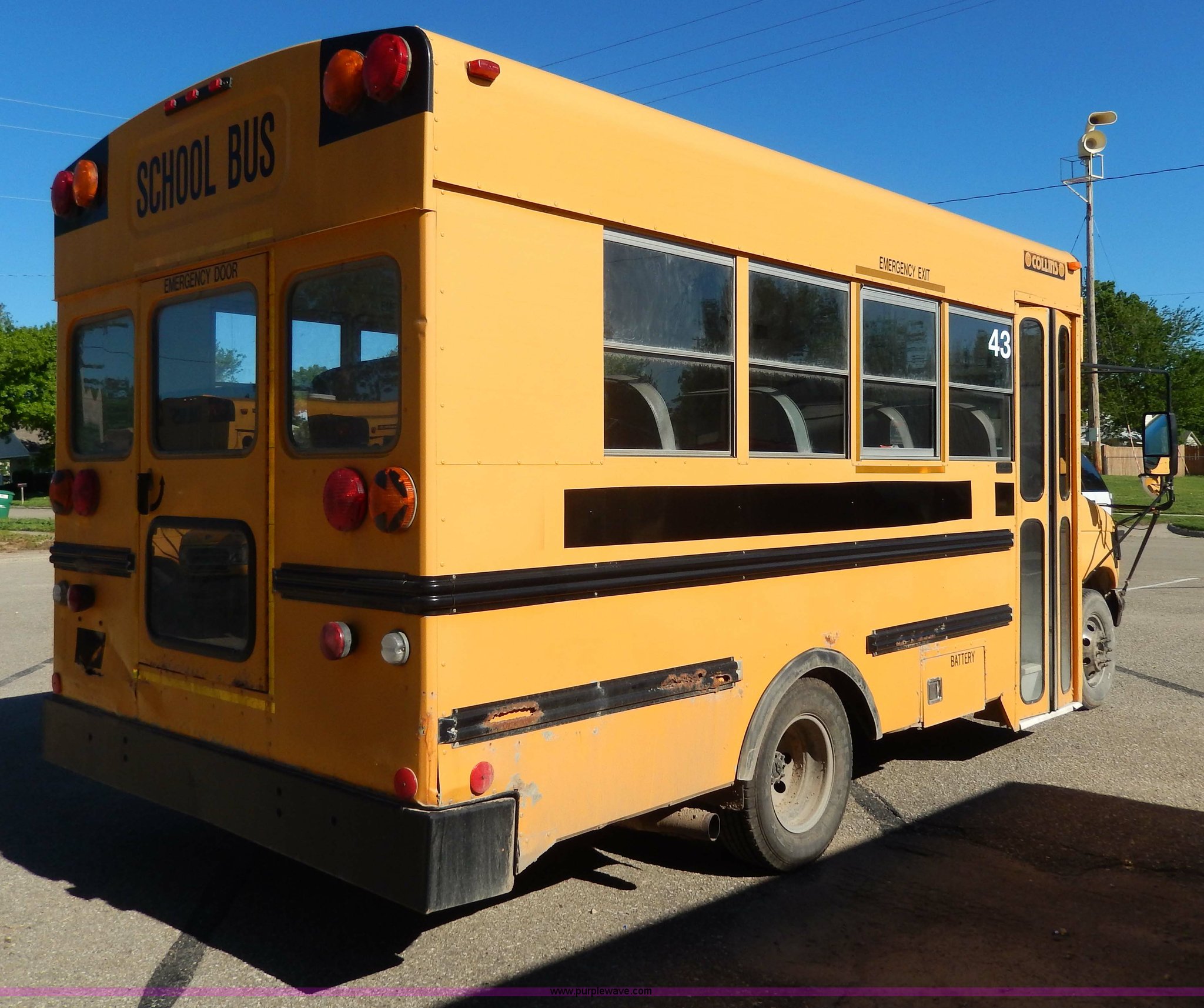1999 Ford Collins school bus in Chapman, KS Item D8090 sold Purple Wave