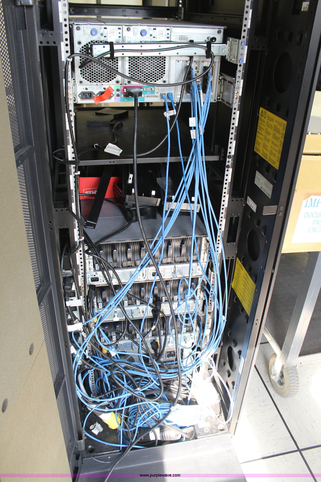 IBM Unix server with enclosed rack in Kansas City, KS Item X9297 sold