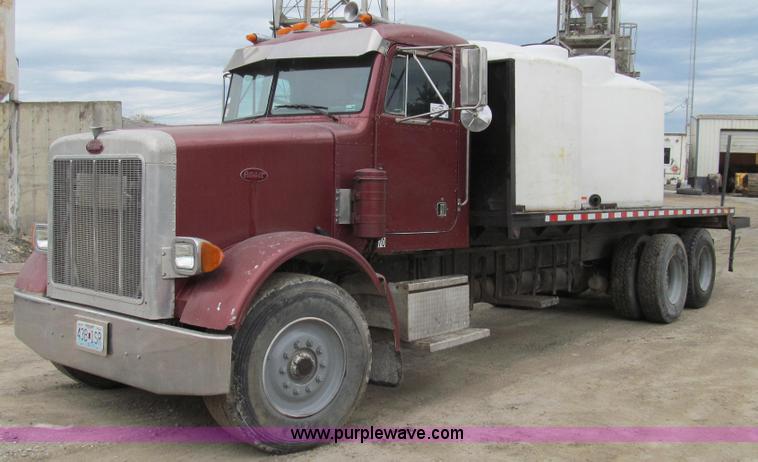 image for item E3997 1987 Peterbilt 357 flatbed truck