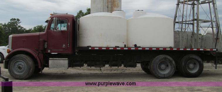 image for item E3997 1987 Peterbilt 357 flatbed truck