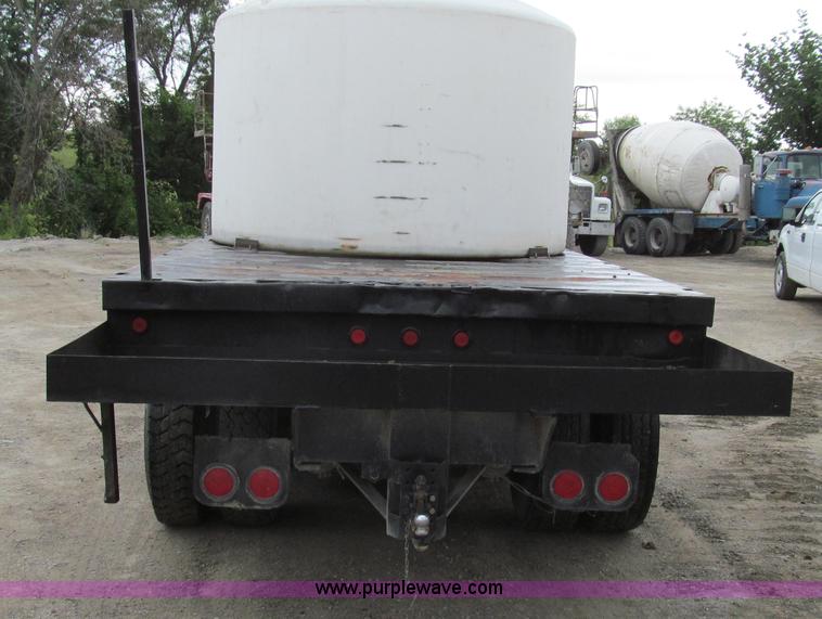 image for item E3997 1987 Peterbilt 357 flatbed truck