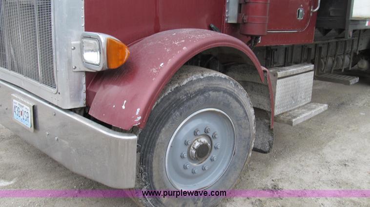 image for item E3997 1987 Peterbilt 357 flatbed truck